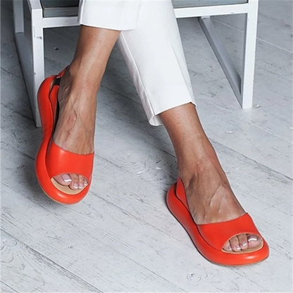 Belro casual summer sandal with open toe design, tan leather straps, and flat sole, perfect for warm weather casual wear.
