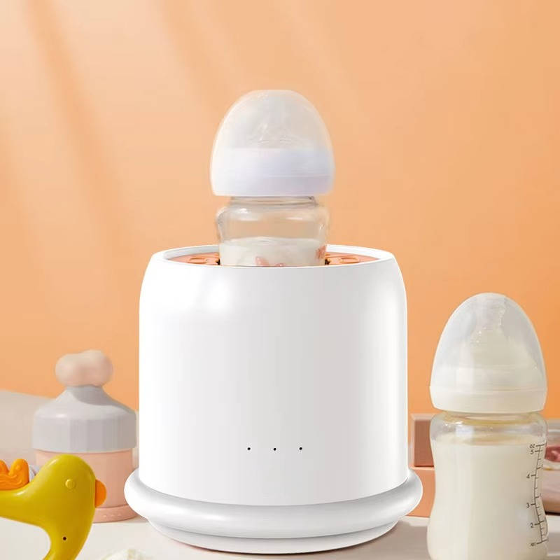 Belro automotive formula feeding milk maker showing a compact device with milk bottles and control buttons.