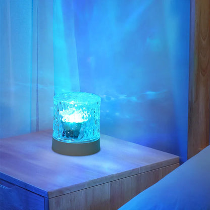 Belro Crystal Ripple Projector Night Light displaying swirling light patterns on a wall in a dark room.