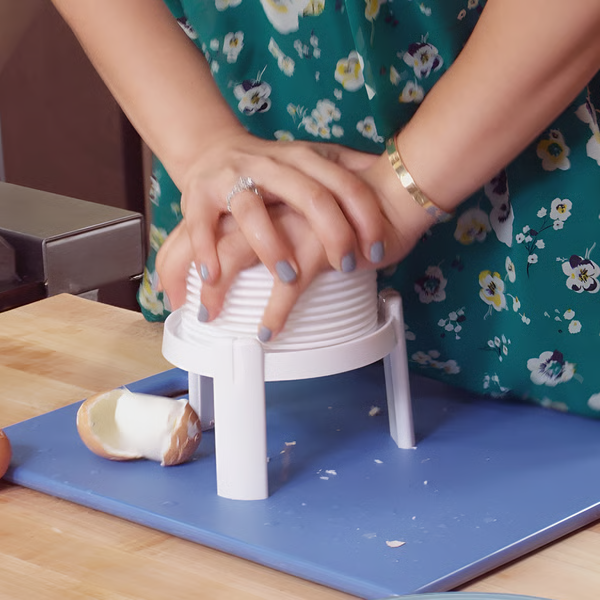 Belro Creative Egg Peeler Tool, a quick and safe kitchen gadget for easily peeling boiled eggs.