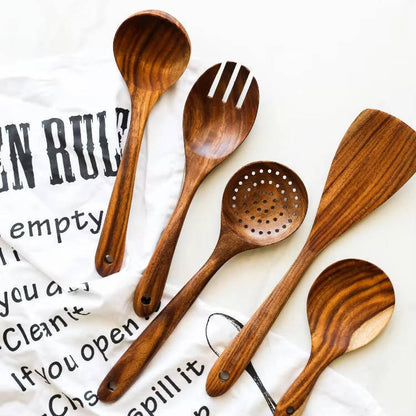 Six-piece wooden utensils set by Belro, including spoons and spatulas, displayed on a kitchen countertop for home and dining use.