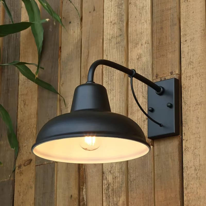 Antique vintage barn light with Belro branding, showcasing rustic metal finish and classic design for farmhouse decor.