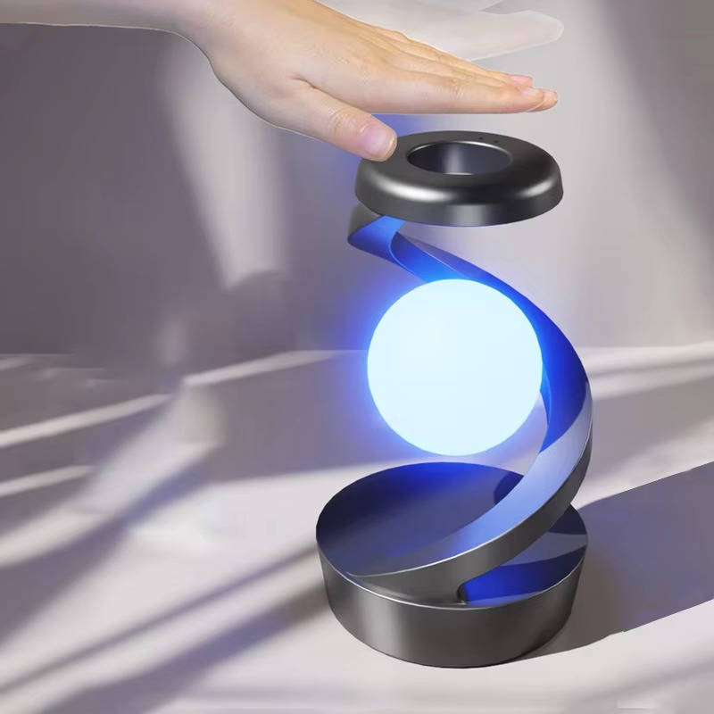 Belro levitating moon lamp with gesture control and wireless charging features, showcasing a glowing moon floating above a base.