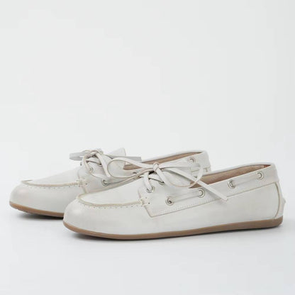 Women genuine leather moccasins from Belro, showcasing soft leather upper and comfortable slip-on design.