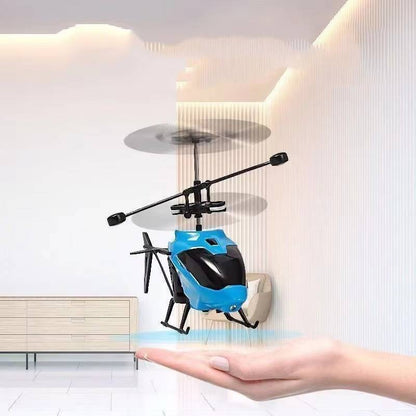Belro RC helicopter toy flying outdoors, showcasing its compact design and vibrant colors for kids' entertainment and play.