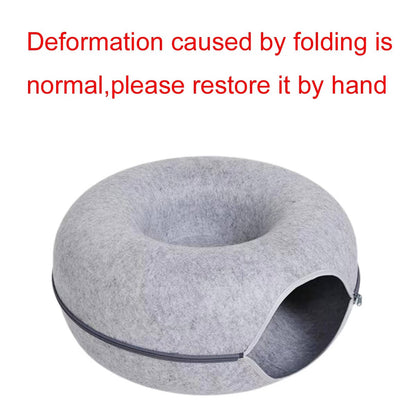 Belro donut bed for cats with soft, plush fabric and raised edges, providing a cozy and comfortable resting spot for feline pets.