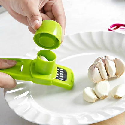 Belro manual mini garlic press and crusher in stainless steel with ergonomic handle for easy garlic crushing in the kitchen.