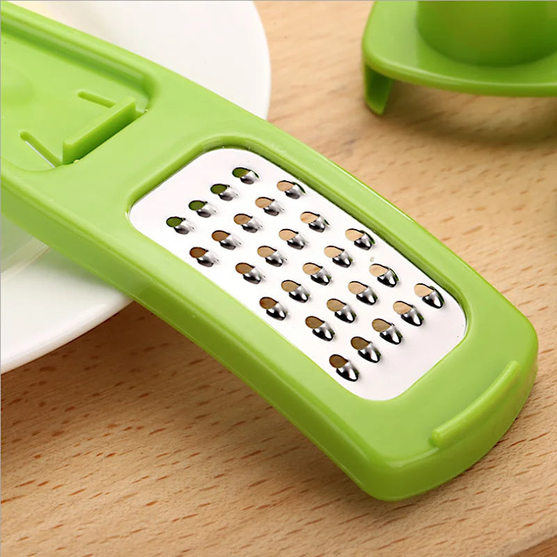 Belro manual mini garlic press and crusher for kitchen, compact tool for crushing garlic cloves in home and dining use.