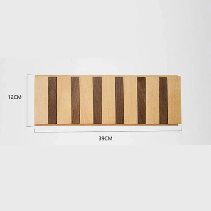 Belro wooden wall-mounted coat rack with multiple hooks for jackets and coats, ideal for organized entryway storage.
