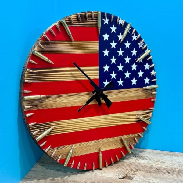 Handmade American flag clock by Belro featuring patriotic flag design with bullet-inspired accents for home decor.