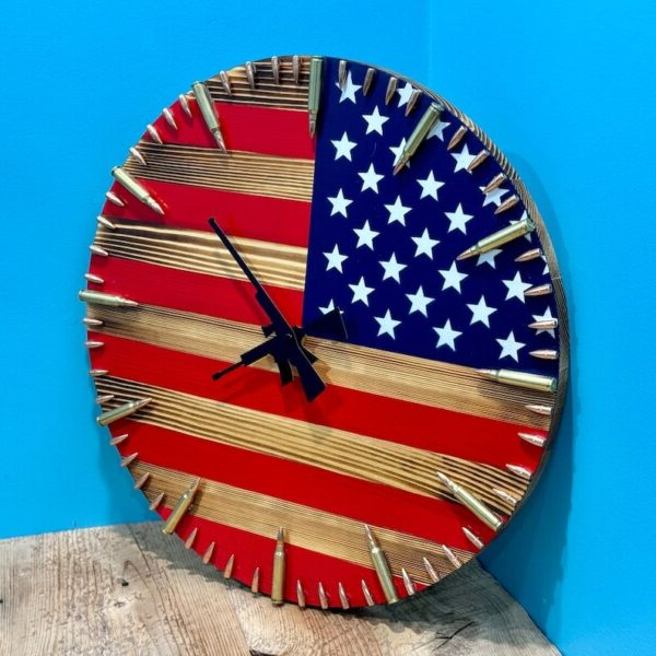 Handmade American flag clock by Belro, patriotic bullet-shaped wall clock with red, white, and blue flag design for home decor.