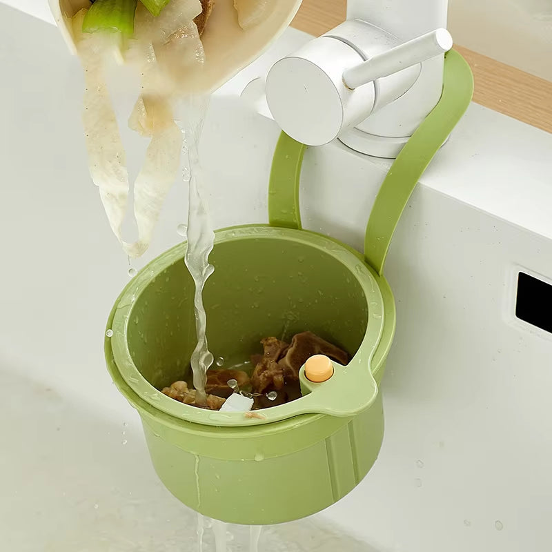 Mivoza hanging drain basket with two-part filter and one-click empty sink organizer in kitchen sink, showing the basket installed.
