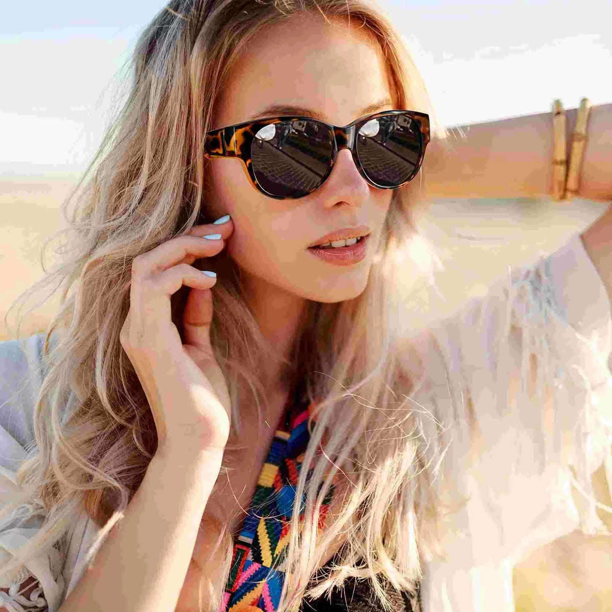 Mivoza fit-over polarized sunglasses with UV protection, designed for glasses wearers, featuring large over-glasses frame and dark lenses.