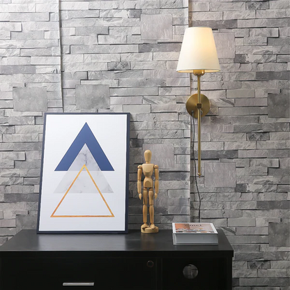 Wireless wall sconce by Belro for outdoor use, featuring a modern design with a sleek black finish and integrated LED lighting.