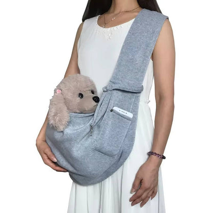 Belro dog carrier sling designed for automotive travel, showing the soft fabric and adjustable straps for comfortable pet transport.