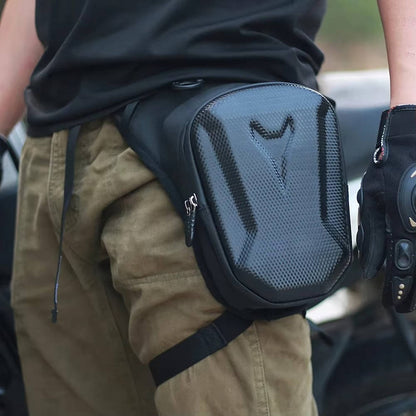 Belro motorcycle leg bag worn on a rider’s thigh, made of durable material, featuring multiple compartments for storage and convenience.