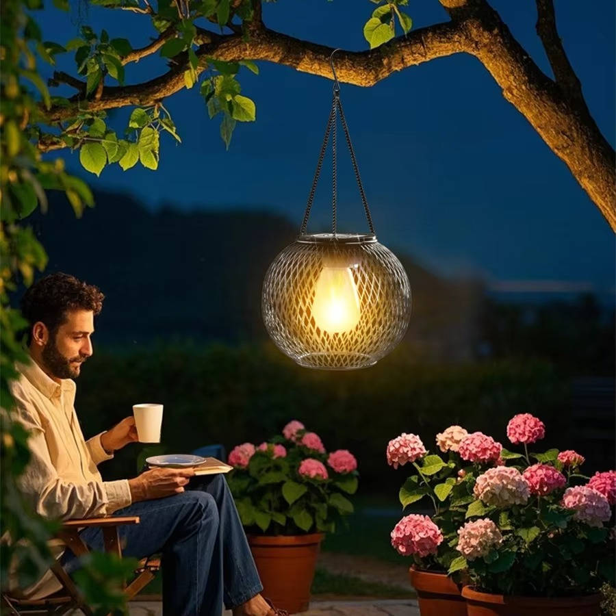 Belro outdoor solar hanging lantern hanging from a patio umbrella, providing ambient light for outdoor accessories.