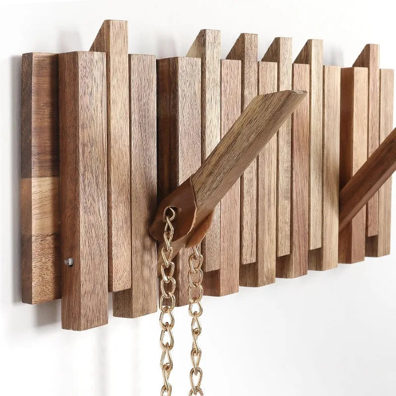 Rustic Belro wall-mounted coat rack with 8 flip hooks for jackets and coats, featuring a natural wood finish and sturdy design.