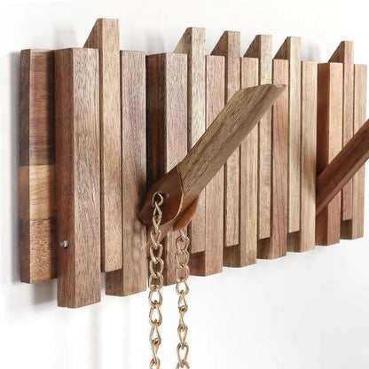 Rustic Belro wall-mounted coat rack with 8 flip hooks for jackets and coats, featuring a natural wood finish and sturdy design.