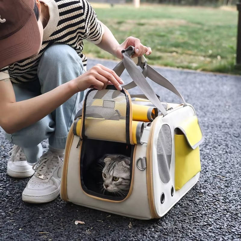 Belro travel pet carrier for cats and small dogs, automotive style, with mesh sides and secure zipper for safe transportation.