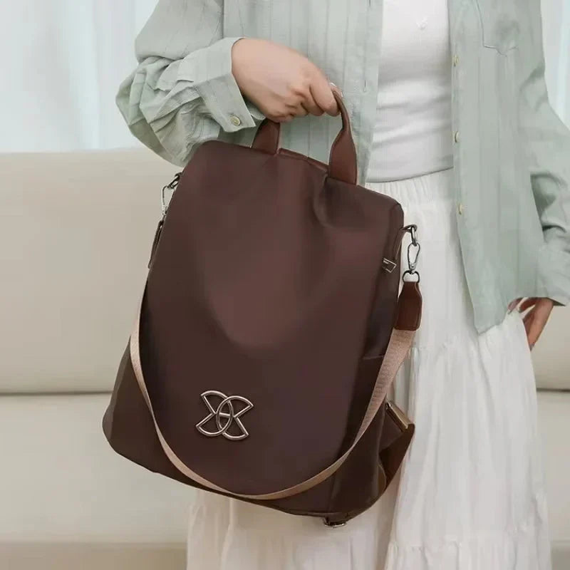 Mivoza anti-theft backpack with water-resistant fabric, multiple carry options, and hidden pockets for secure everyday use.