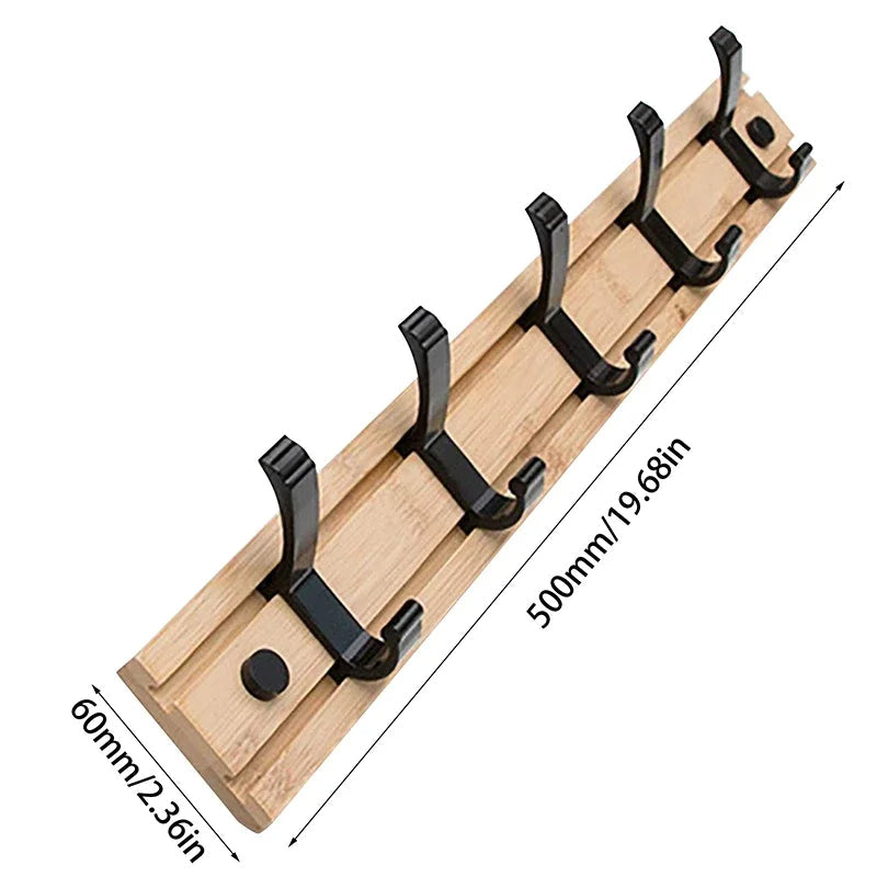Wooden wall-mounted coat rack with sliding hooks, Belro brand, designed for hanging jackets and coats in an entryway or hallway.