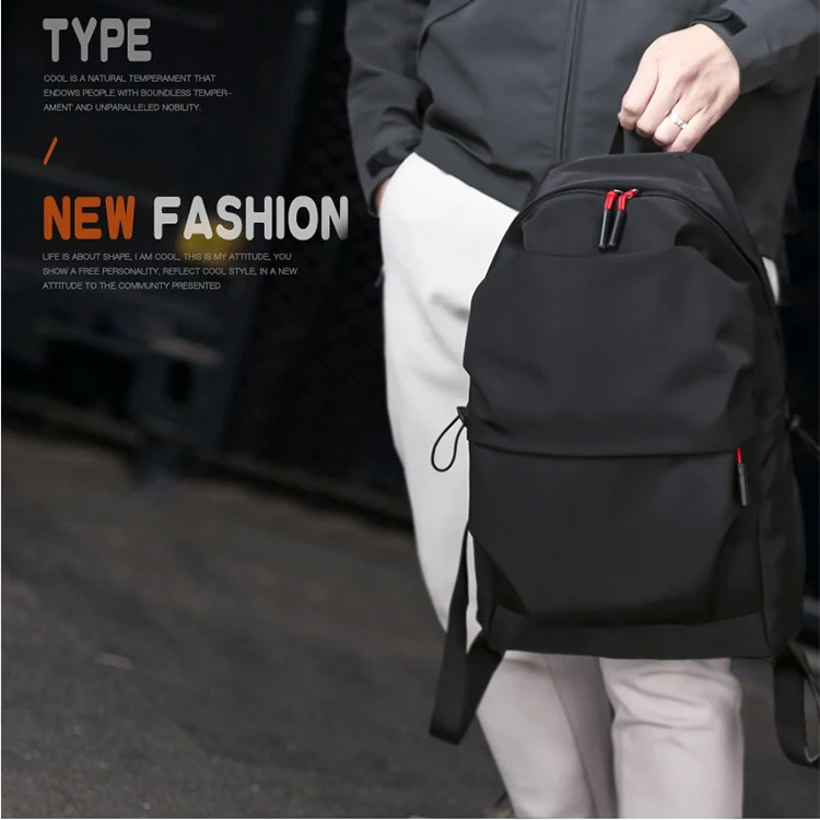 Black minimalist backpack by Belro designed for electronics and laptop storage, with sleek and simple modern style.