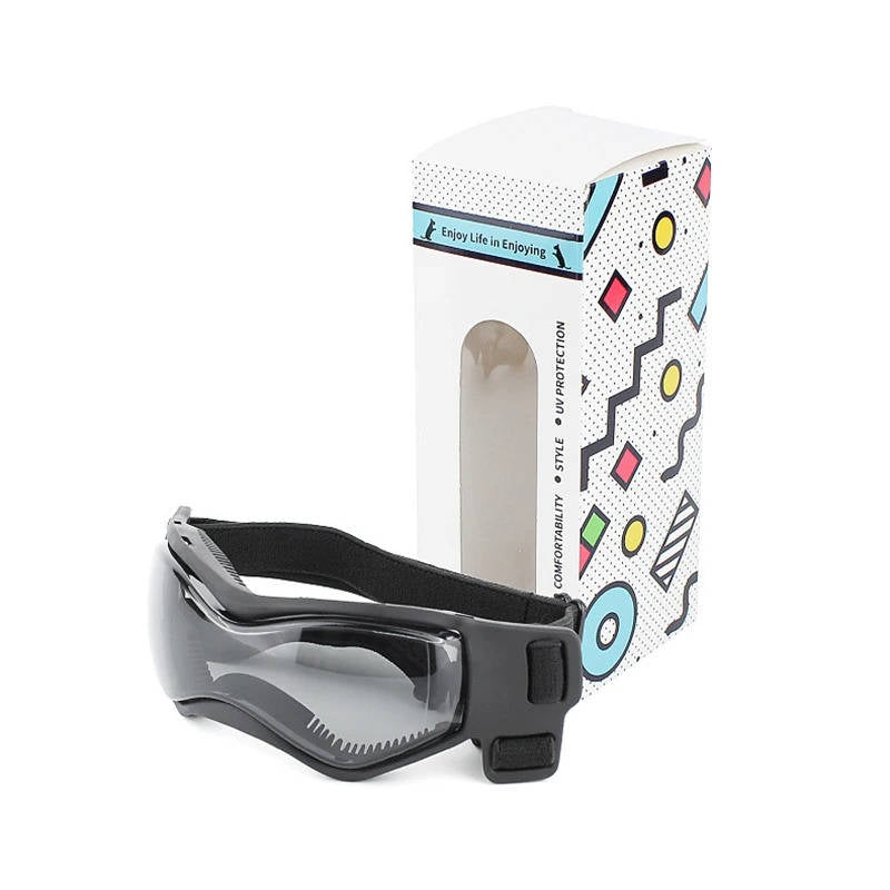 Belro dog goggles in black with adjustable straps, designed to protect dogs' eyes during outdoor activities.