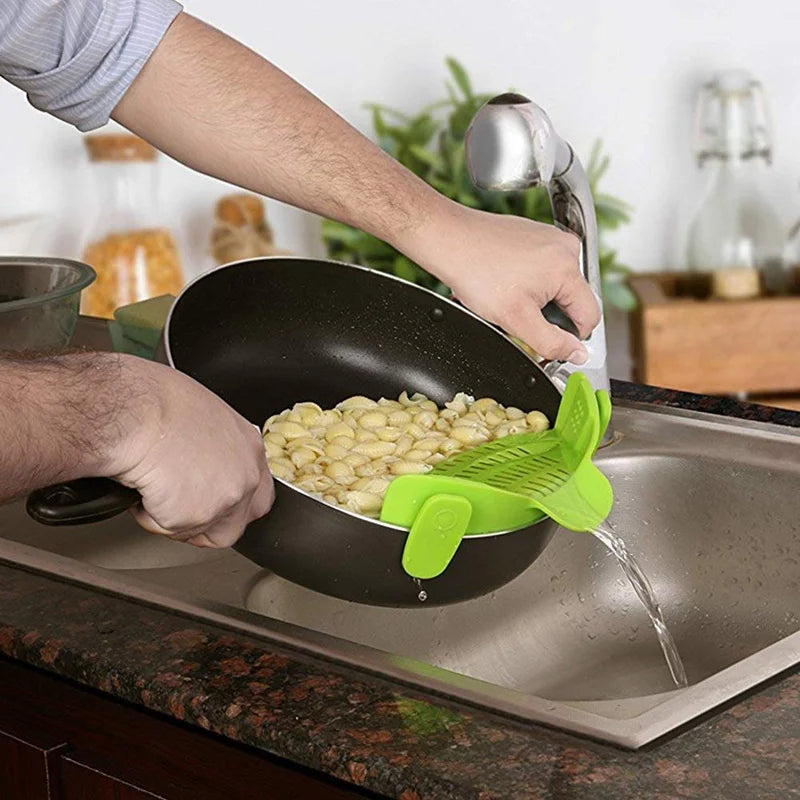 Belro universal silicone pot pasta strainer clipped onto a pot, easy draining kitchen utensil for pasta and vegetables.