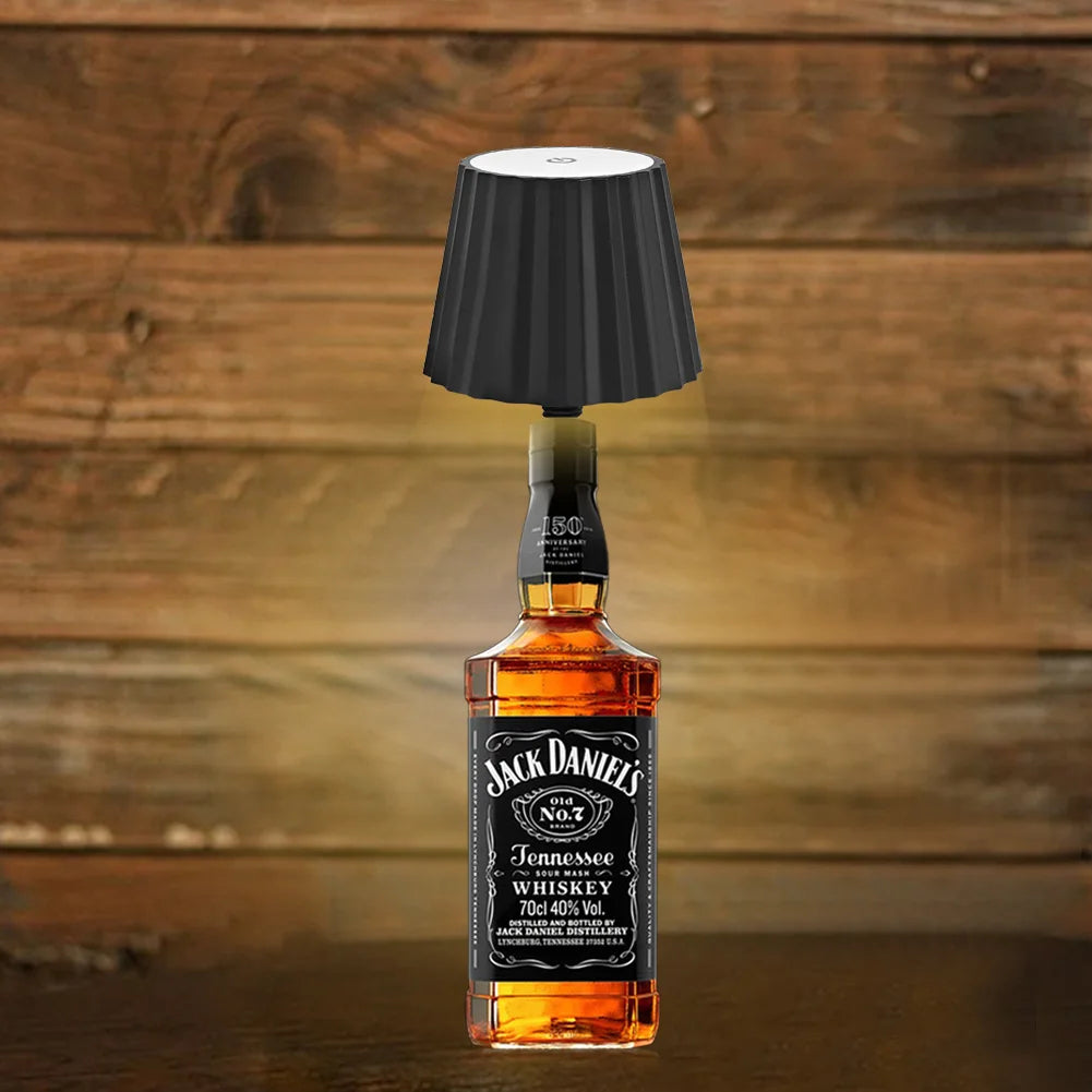 Belro wine bottle table lamp with illuminated glass bottle and LED light, suitable as decorative lighting for home or bar areas.