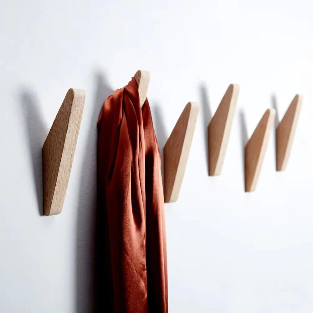 Belro wooden coat hook and decorative coat holder for jackets and coats, featuring a natural wood finish and stylish design.