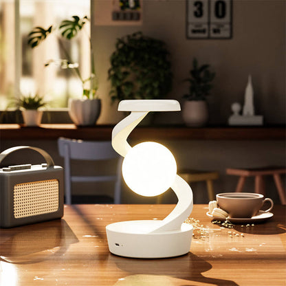 Belro levitating moon lamp with gesture control and wireless charging, showcasing a glowing moon floating over a modern surface.
