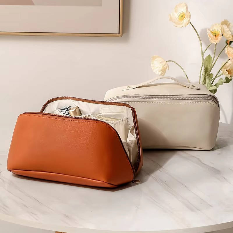 Belro cosmetics storage bag with zip closure, compact design, and multiple compartments for organizing makeup and toiletries.