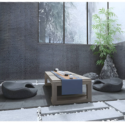 Belro meditation cushion in soft, neutral fabric, designed for comfortable seated meditation practice.
