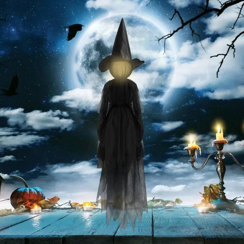 Belro sound-activated Halloween decoration featuring a hand holding a witch, suitable for indoor and outdoor Halloween displays.