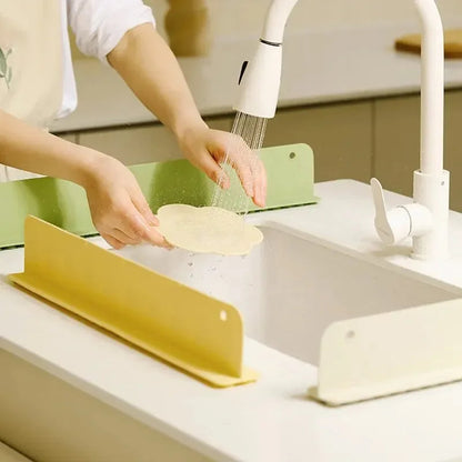 Belro silicone sink splash guard with suction cups, kitchen appliance accessory to prevent water splashes in the sink.