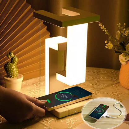 Belro floating lamp with integrated wireless charger, sleek modern design, illuminated with soft light, placed on a wooden surface.