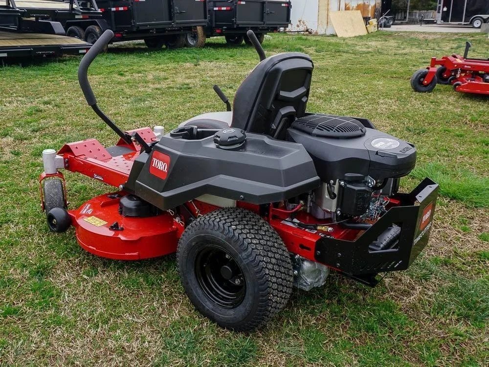 Toro 75746 42-inch TimeCutter zero-turn mower with 22HP Kohler engine, shown in a lush green lawn setting.