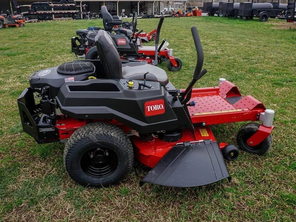 Toro 42-inch TimeCutter zero turn mower with 22HP Kohler engine, featuring a cutting deck and comfortable seat.