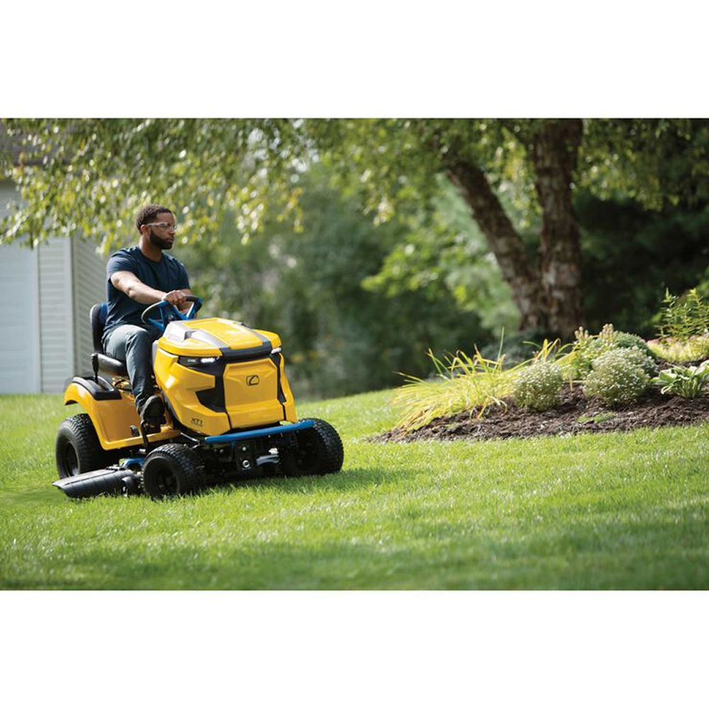 Casavibeo Cub Cadet XT1 LT42E 42-inch electric lawn tractor with cutting deck, showcasing its mower deck and control panel.