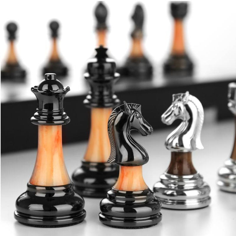 Belro luxury metal chess set with detailed pieces on a large 42 cm wooden chessboard, ideal for strategic tabletop play.