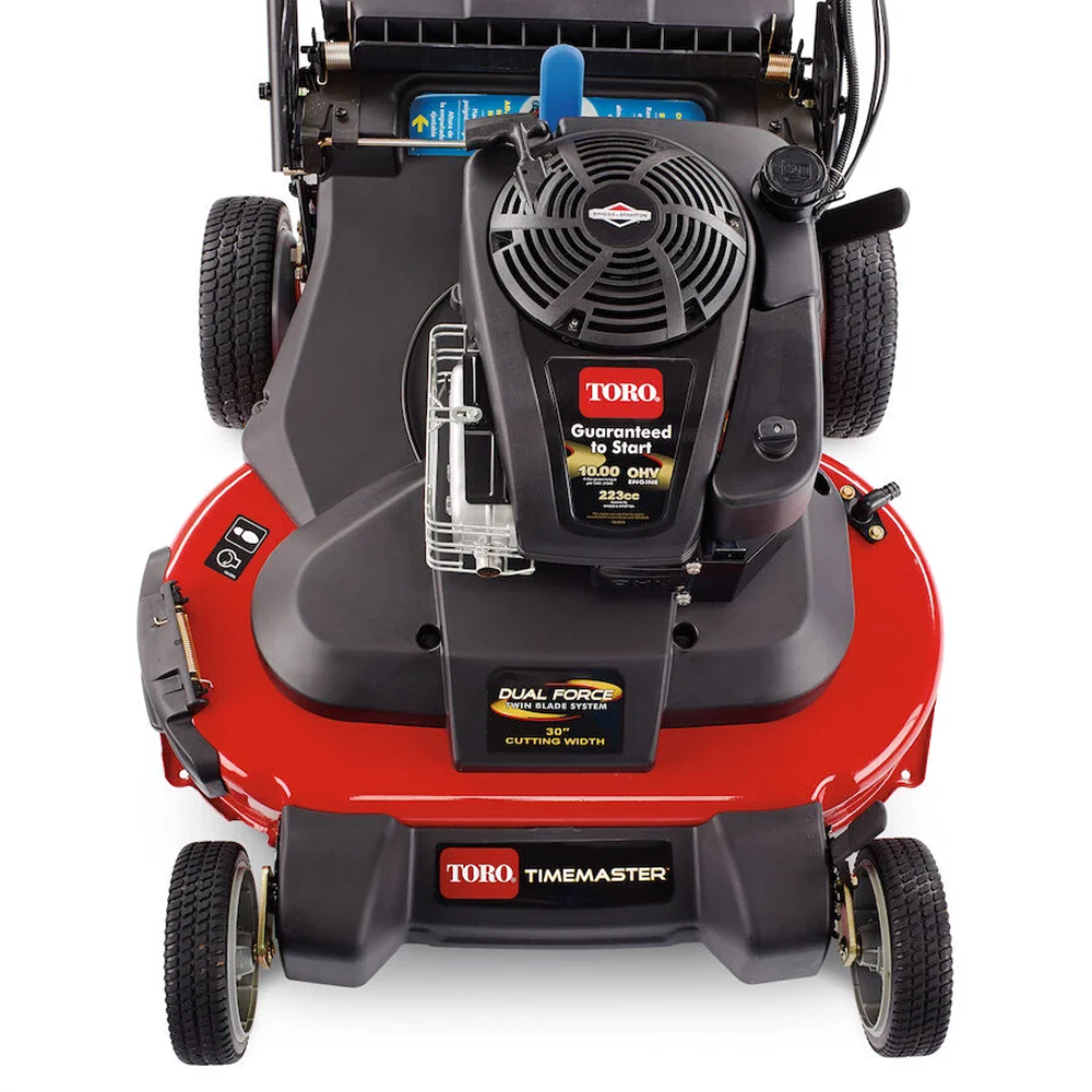 Casavibeo Toro TimeMaster 21199 30-inch gas self-propelled lawn mower with 223cc engine, shown in a sunny outdoor setting.