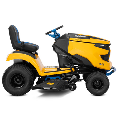 Casavibeo Cub Cadet XT1 LT42E electric lawn tractor with 42-inch cutting deck and sturdy design, shown in a lush green yard.