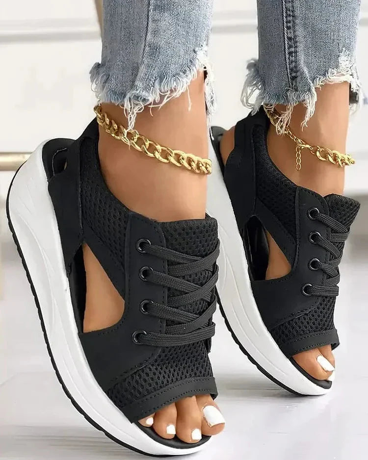 Belro contrast paneled cutout lace-up muffin sandals featuring stylish design and open toe for casual summer wear.
