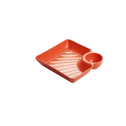 Mivoza dipping plate with sauce compartment, stackable and no-drip design, ideal for serving condiments and sauces.