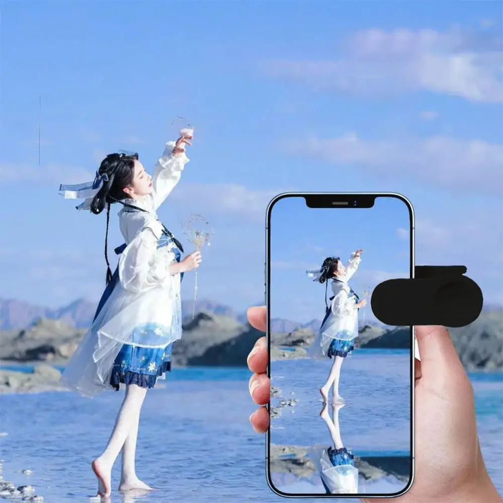 Mivoza camera mirror reflector clip attached to a smartphone lens, showcasing a creative kaleidoscope effect for photography accessories.