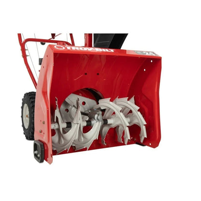 Troy-Bilt Storm 24-inch two-stage gas snow blower with large auger and handles, ready for winter snow removal.
