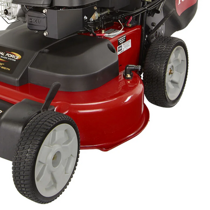 Casavibeo Toro TimeMaster 21199 30-inch gas self-propelled lawn mower with 223cc engine, shown outdoors in use.