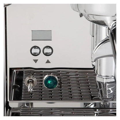Casavibeo ECM Mechanika Max rotary espresso machine with stainless steel exterior and portafilter in use.