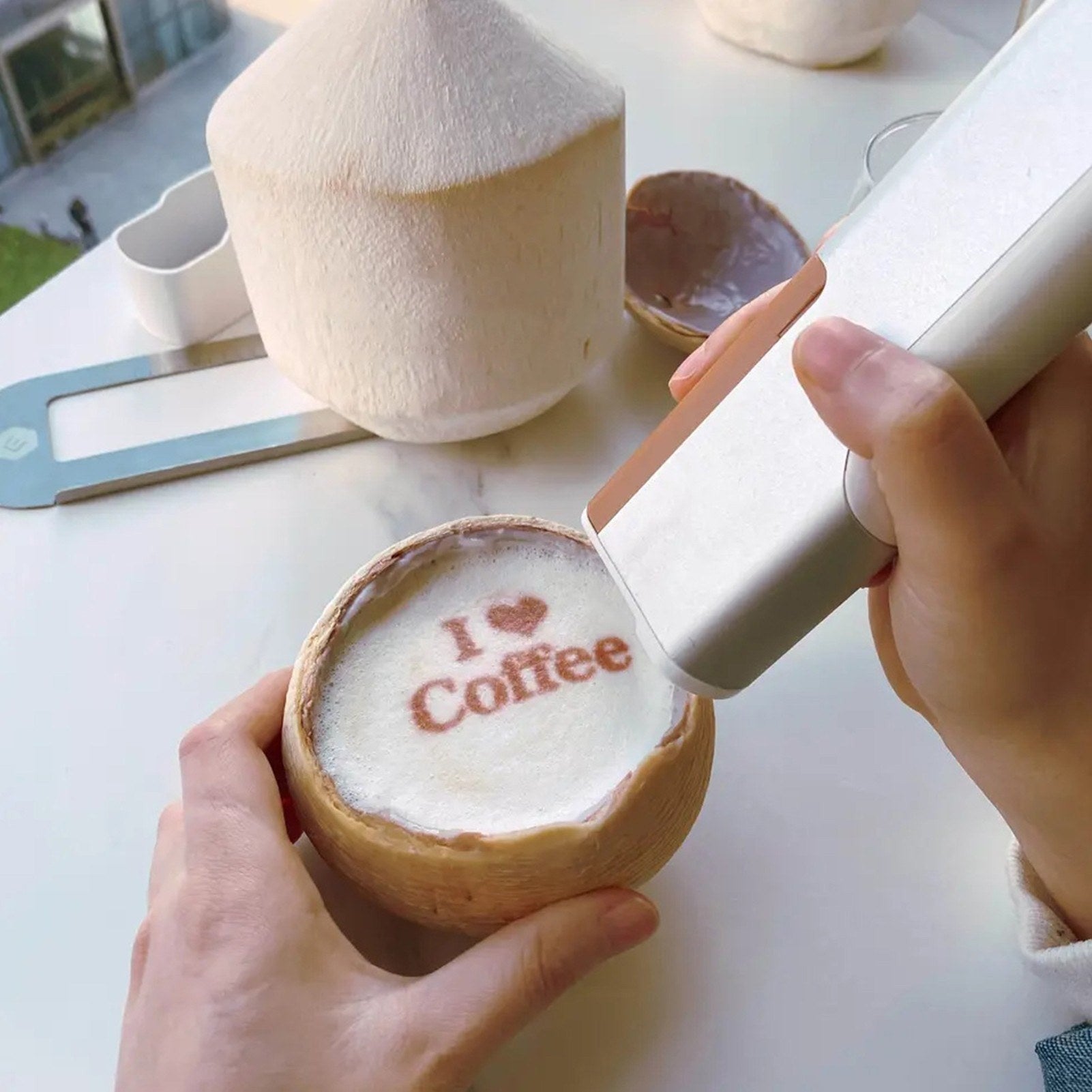 GETDECO EVEBOT Printpen handheld portable food and coffee art inkjet printer, showing its compact design for DIY edible decorating.